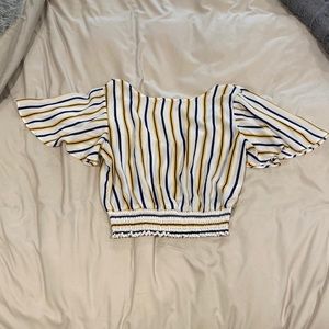 Blue and yellow striped blouse with cinched waist and tie back